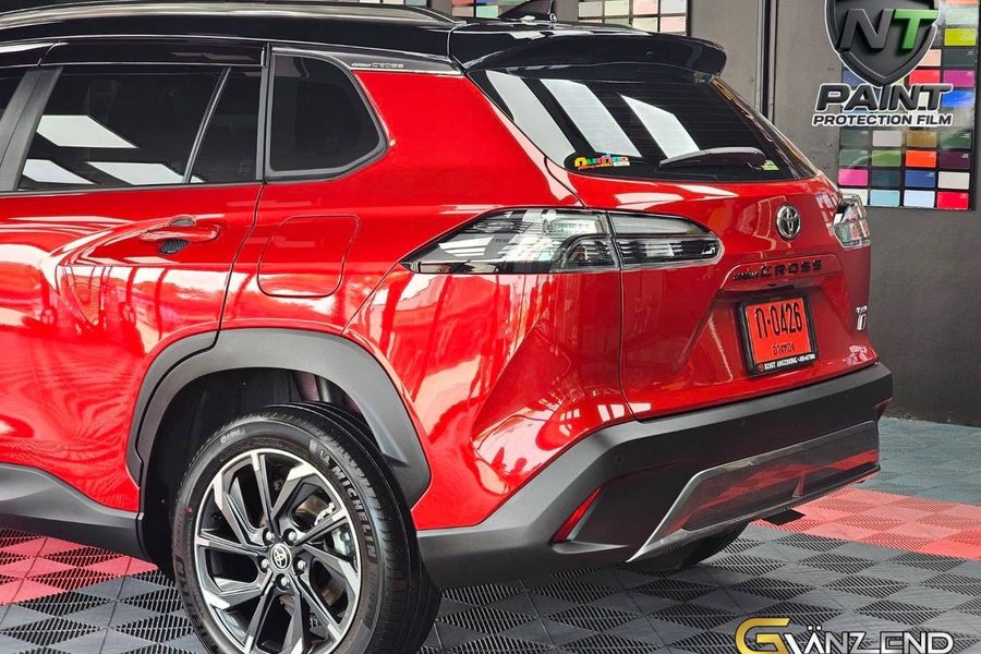 รถ SUV สีแดงหลังติดฟิล์มใสกันรอย — ณธีร์ คาร์วอช
